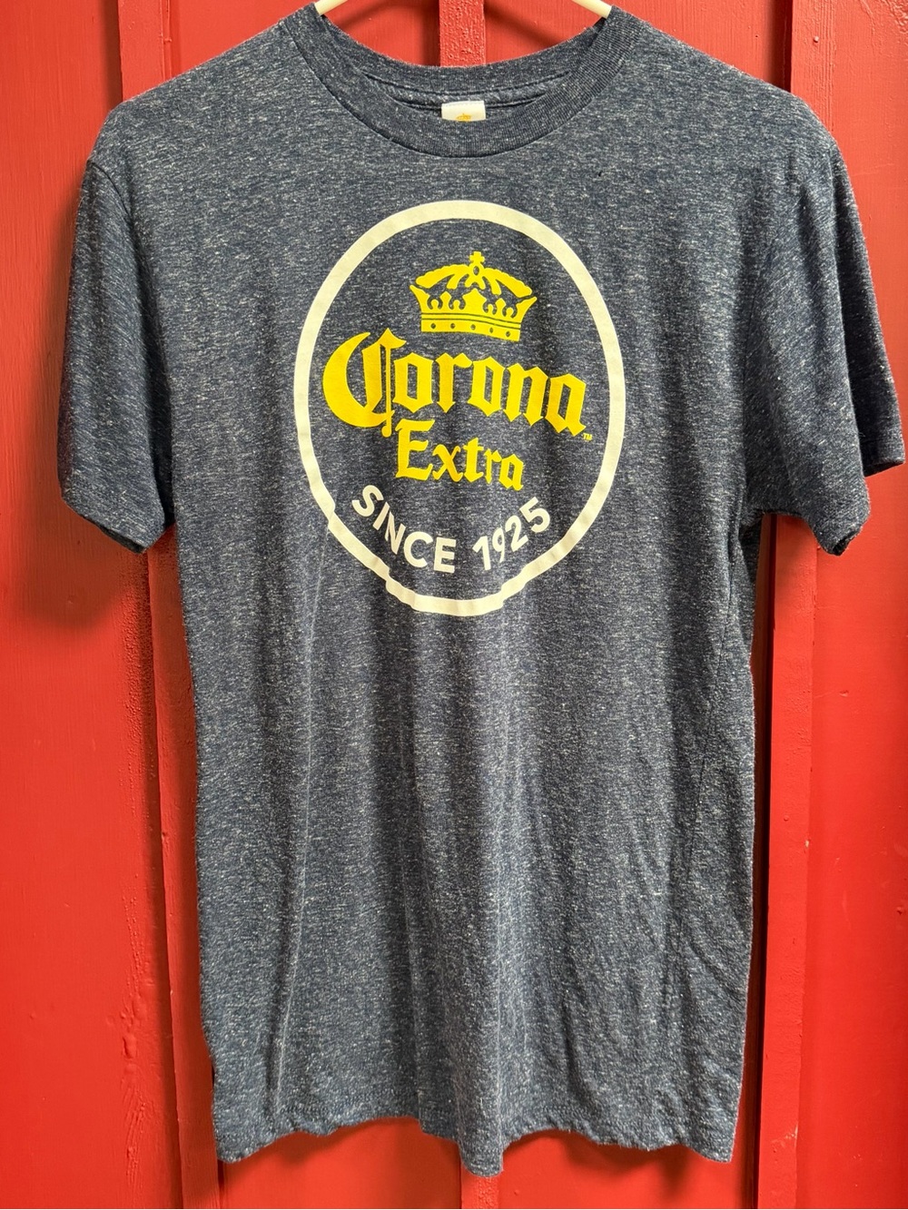 Corona Men's Heather Navy Short Sleeve Tee with Yellow Logo